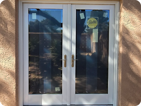 Pella double French door installation with full-view glass panels